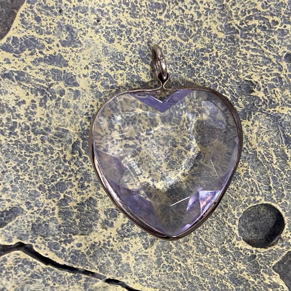 White clear crystal cut acrylic and silver heart shape pendant. Used.